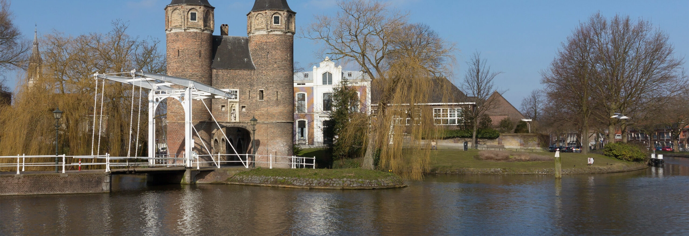 Historic canal, traditional houses and architecture in Delft