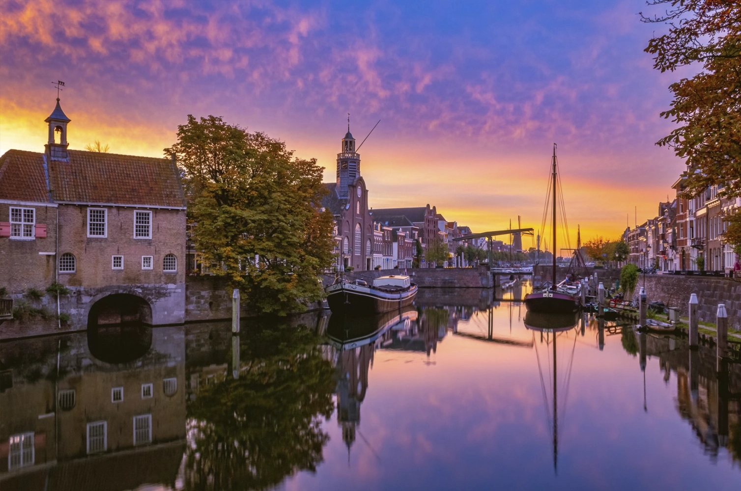 Historic canal and traditional buildings in Delfshaven Rotterdam