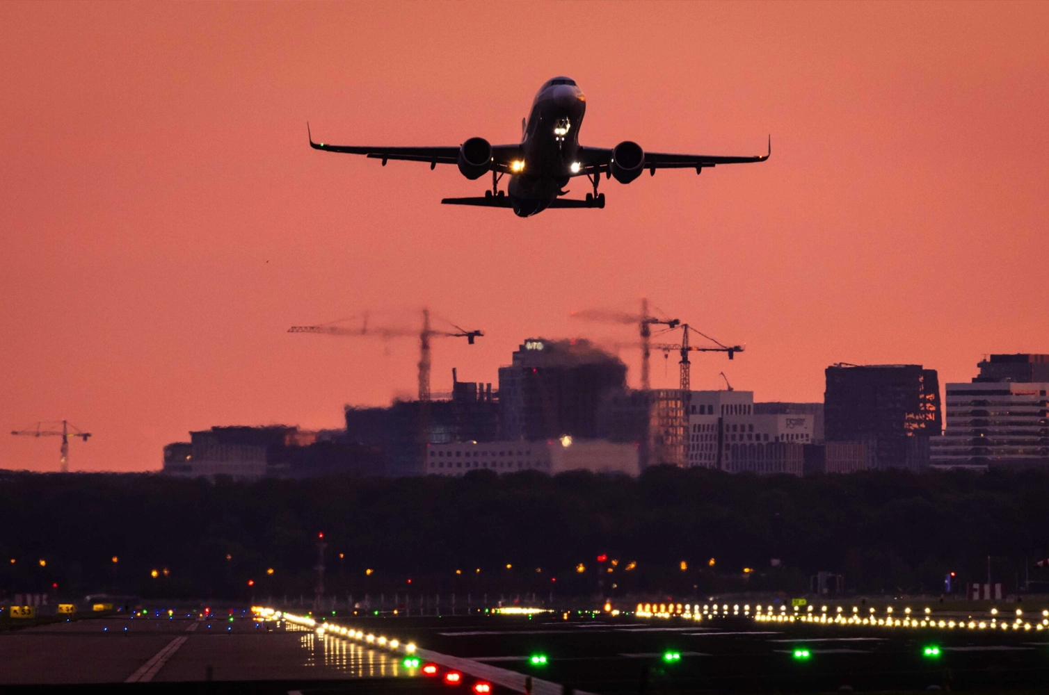 Evening flight arriving at Schiphol Airport with beautyfull sundown