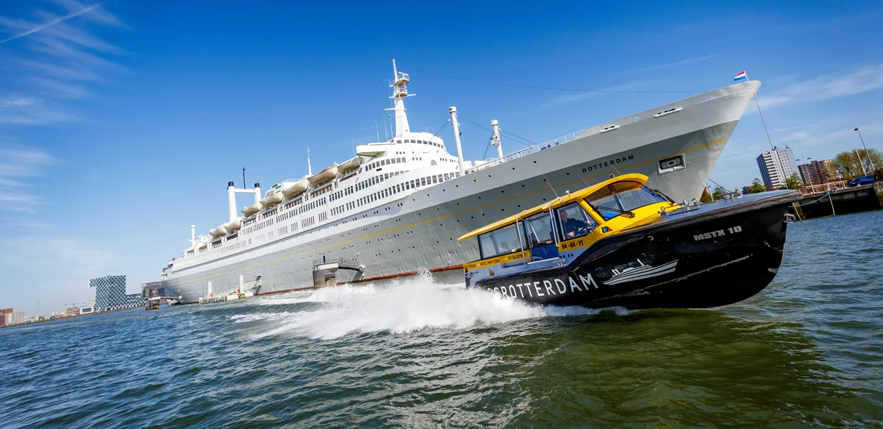 See the SS Rotterdam from a water-taxi