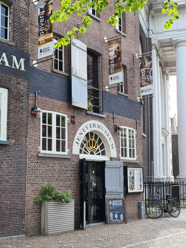 Historic canals and traditional windmills during a private Rotterdam and Schiedam tour
